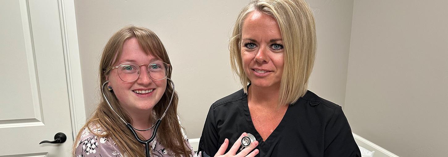 Idaho WWAMI medical student Sydney Mena uses a stethoscope.